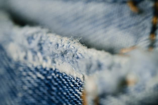 A close-up of high-quality streetwear fabrics like cashmere, merino wool, and premium denim, showcasing their textures and subtle luxury. These fabrics are neatly arranged, emphasizing sophistication and attention to detail.