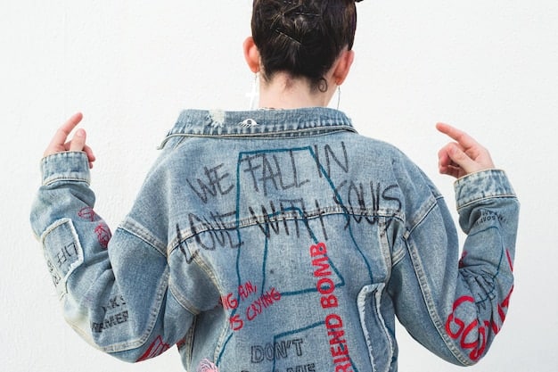A shot of someone wearing a stylish denim jacket with unique streetwear elements, highlighting the texture and design of the denim. The background should be an urban setting to emphasize the streetwear vibe.