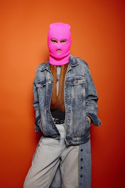 A collage showcasing different affordable streetwear pieces for women. The collage includes images of oversized t-shirts, hoodies, joggers, sneakers, and accessories like bucket hats and chain necklaces. Each item is labeled with its price, all under $50. The background is a clean, white surface to highlight the clothing items.