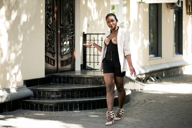 A fashion influencer showcasing different ways to style a classic white shirt with various contemporary accessories, including layered necklaces, a bold belt, and chunky sneakers.