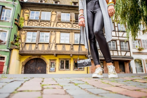 A person wearing a pair of clean, classic sneakers walking confidently on a city street, symbolizing the style and investment potential of a well-maintained sneaker collection.