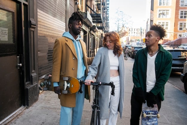 A diverse group of young individuals walking in an urban setting, all wearing stylish streetwear that incorporates elements of graffiti or street art, such as graphic tees, painted jackets, or uniquely patterned sneakers. The image conveys a sense of community and urban trend-setting.